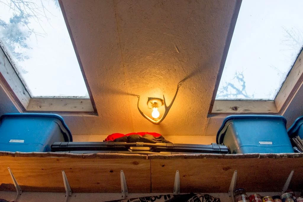 Brooks sleeps on a fold-down loft bed (Photo: Scott Brooks/Brendan McGarry Photography)