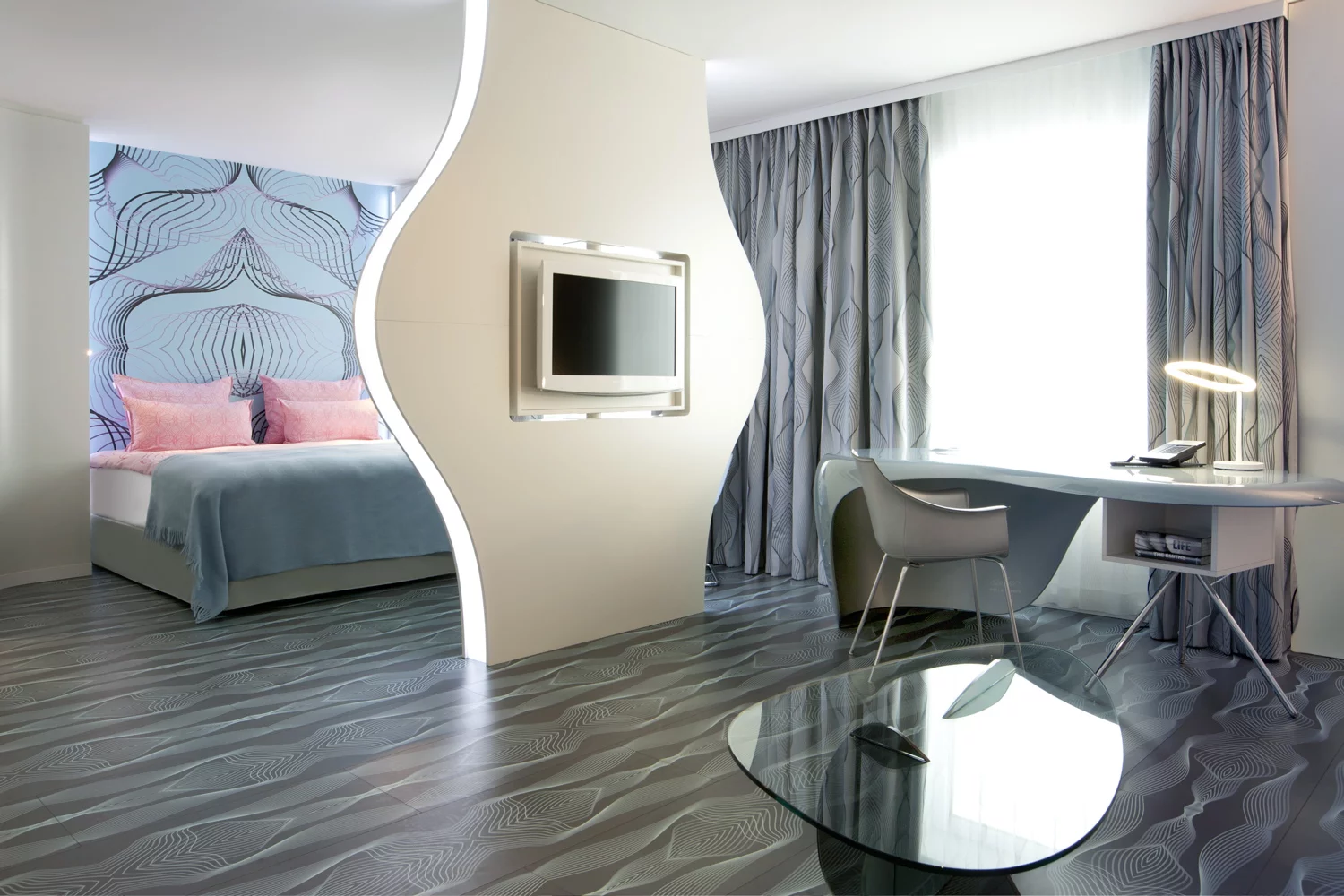 Junior Suite living room and bedroom in blue color scheme(Image by nhow Berlin)