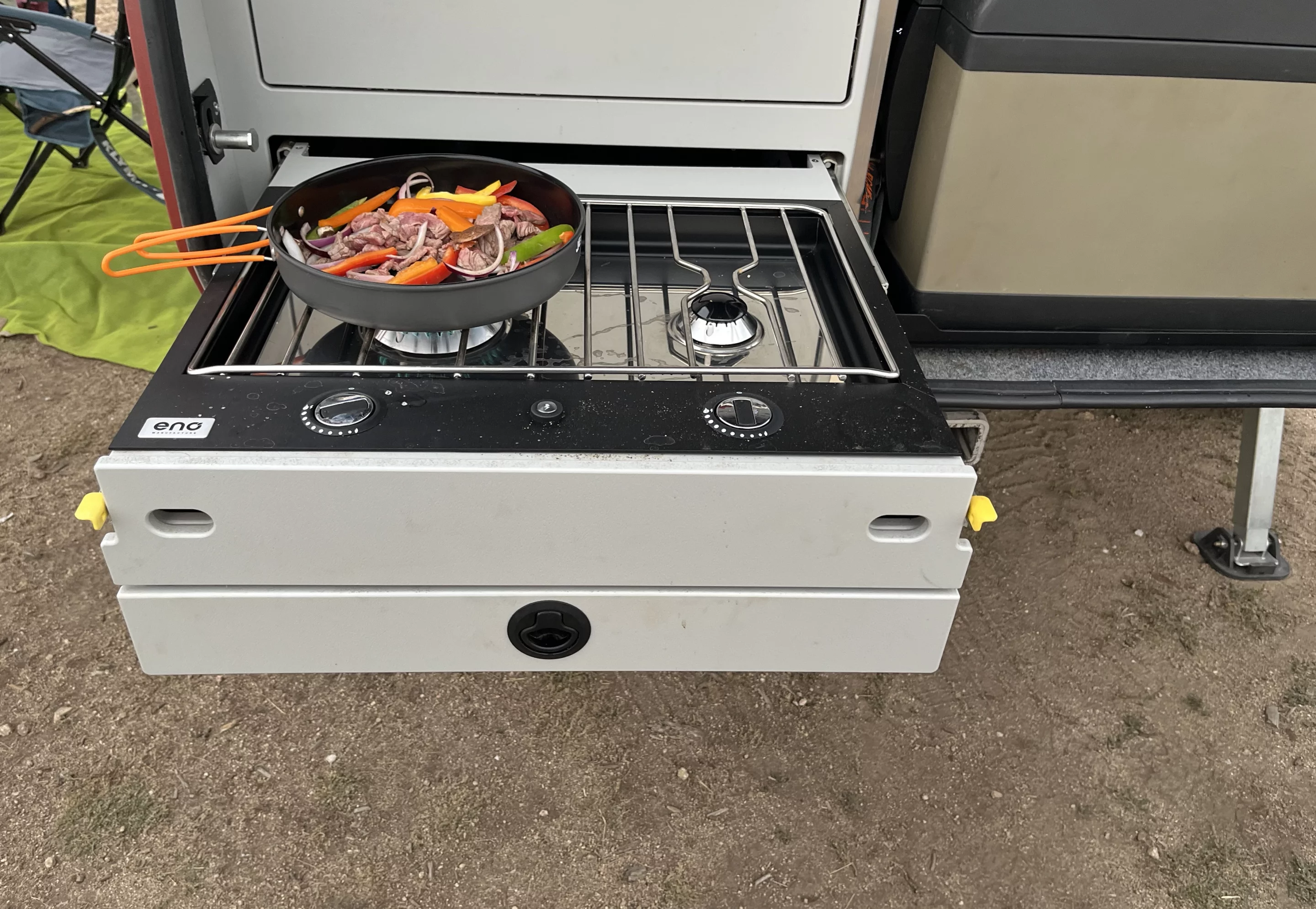 The slide-out stove is one of the more unique features of the Escapod Topo2 design, allowing the trailer to offer more worktop space for prep and storage. It worked nicely for cooking fajitas