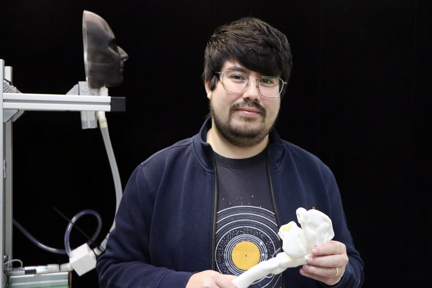 Lead author Nicolás Catalán holding the 3D-printed upper airways model