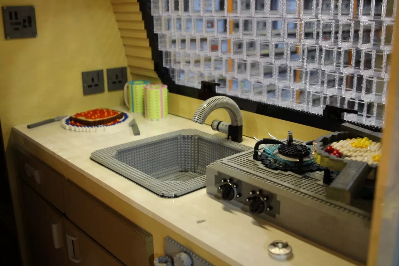 Inside, the design has running water and model appliances