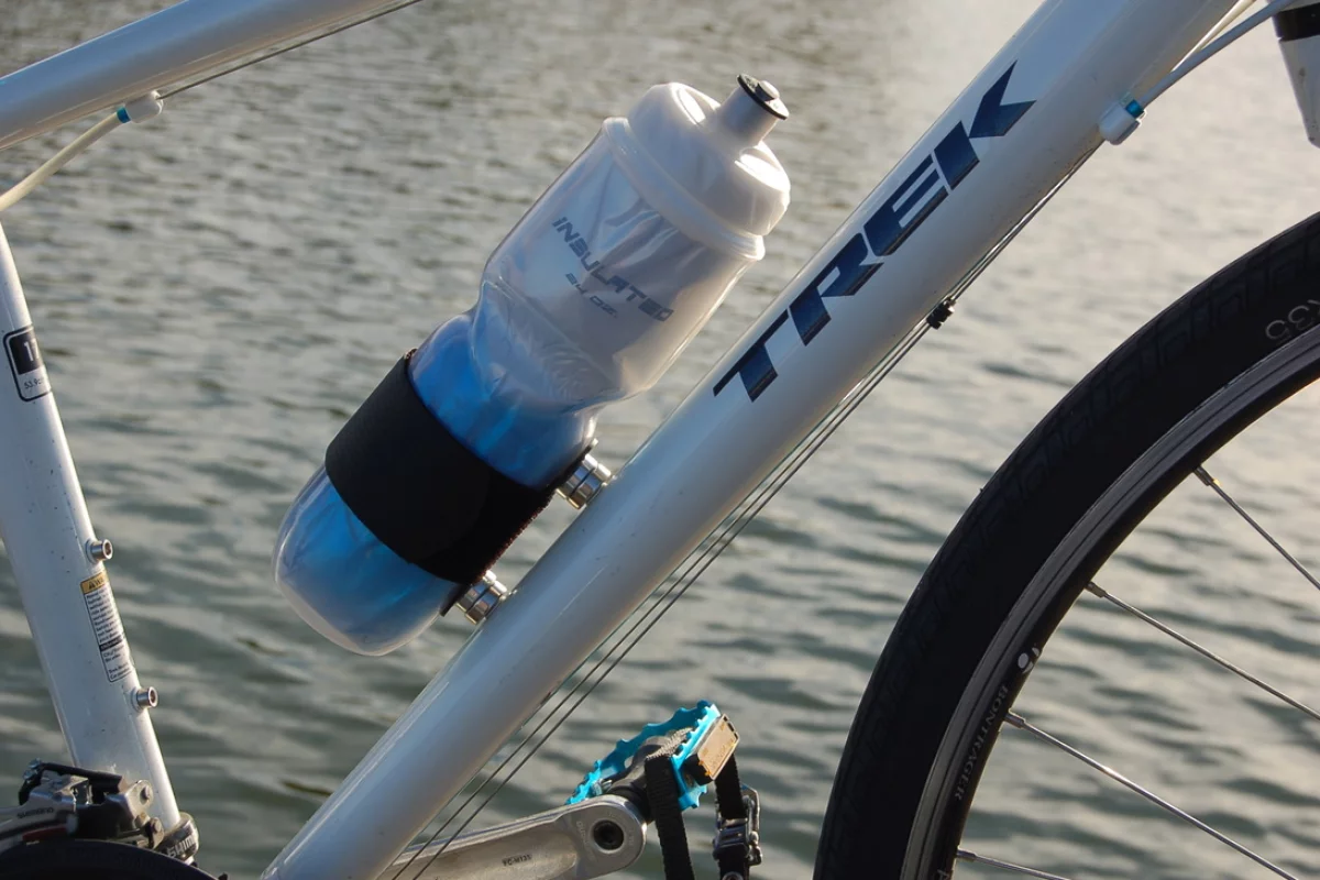 SnapFlask is strapped onto existing water bottles