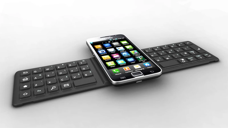 one2TOUCH silicon keyboard operates when a smartphone is set on top of the center pad