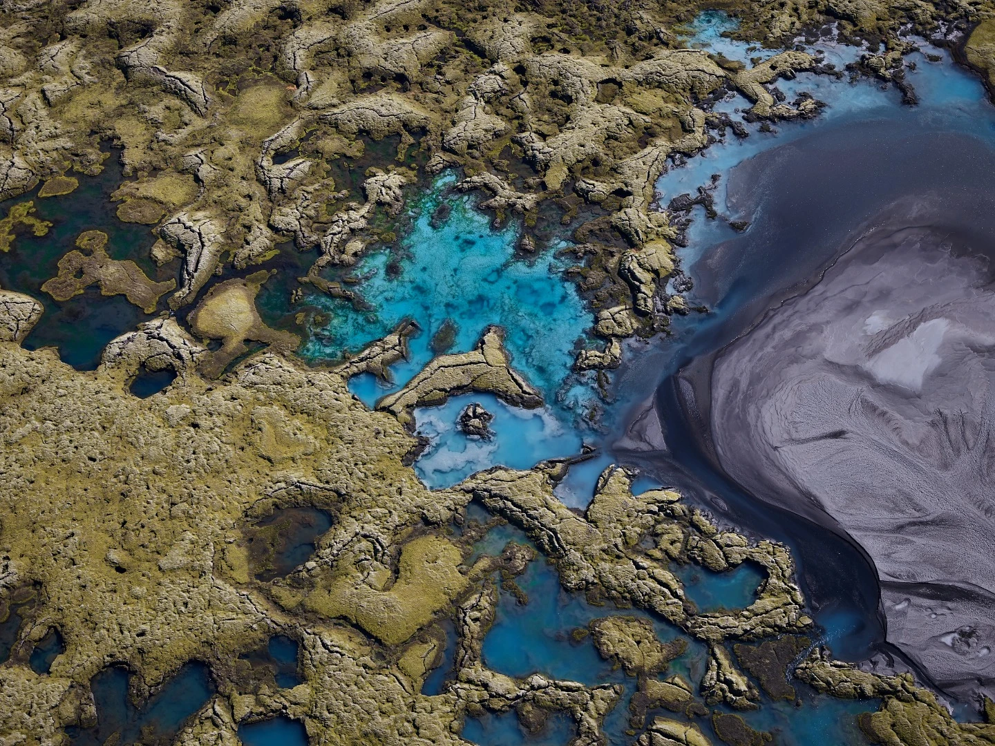 Lava, moss and lakes - a bizarre combination which can be find only in Iceland. This aerial shot was taken from a small Cessna.