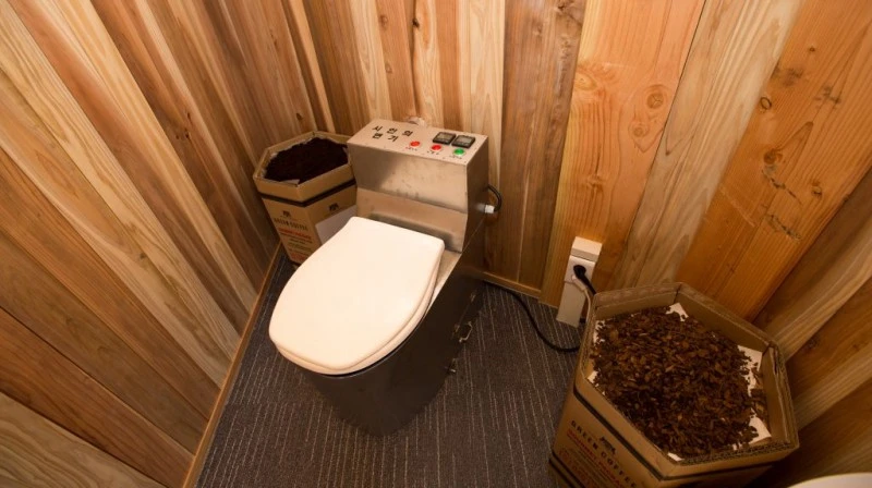 The toilet uses an anaerobic system to break the waste down into a dry, odorless material, and let microbes biodegrade it into harvestable carbon dioxide and methane