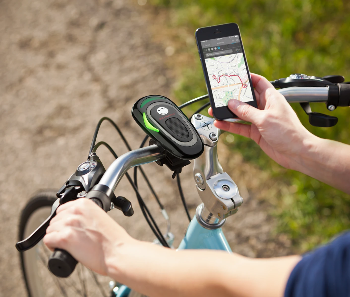 The CycleNav is paired with the user's safely-stowed smartphone
