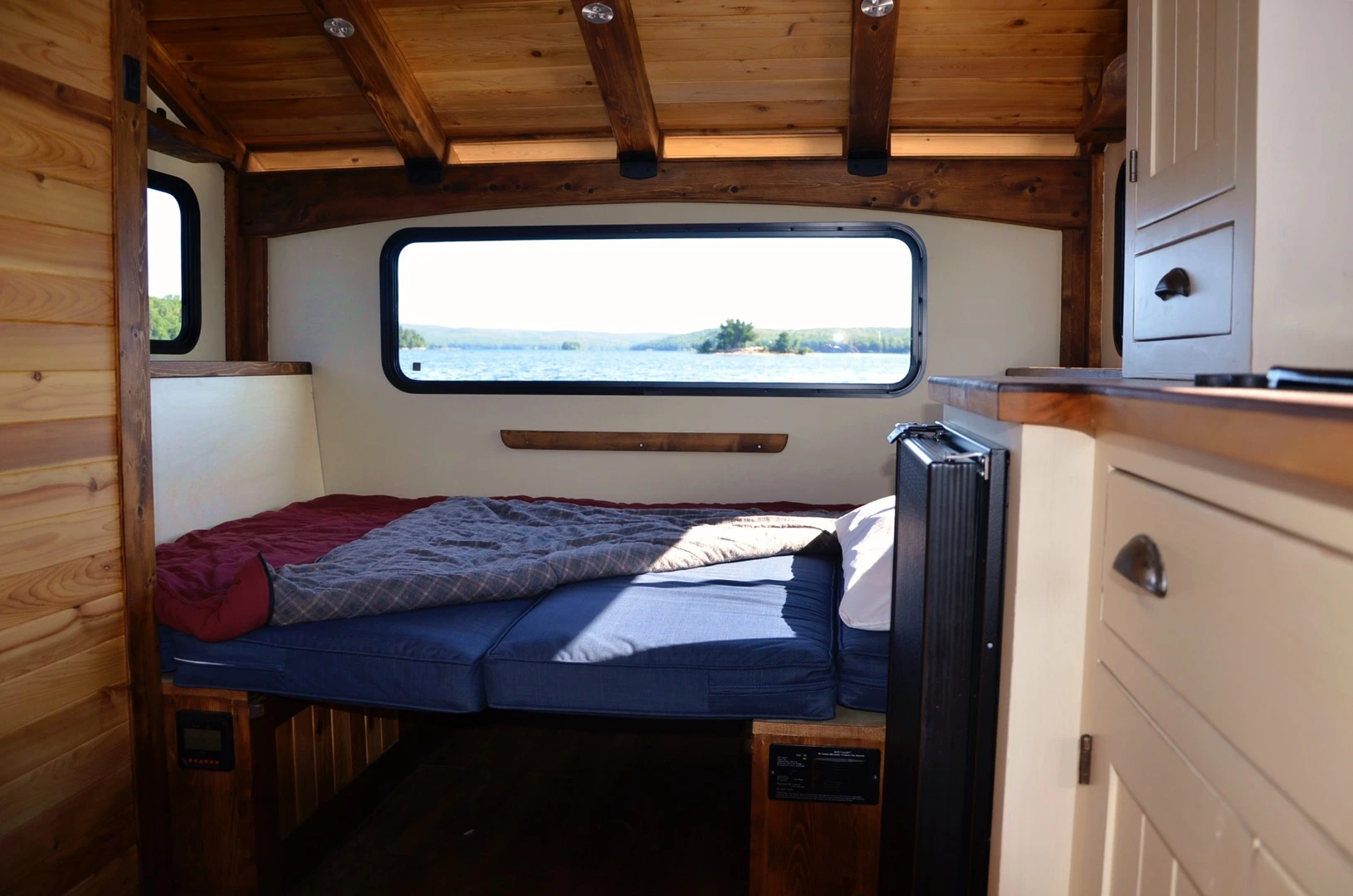 Le Koroc's dining area converts into a bed