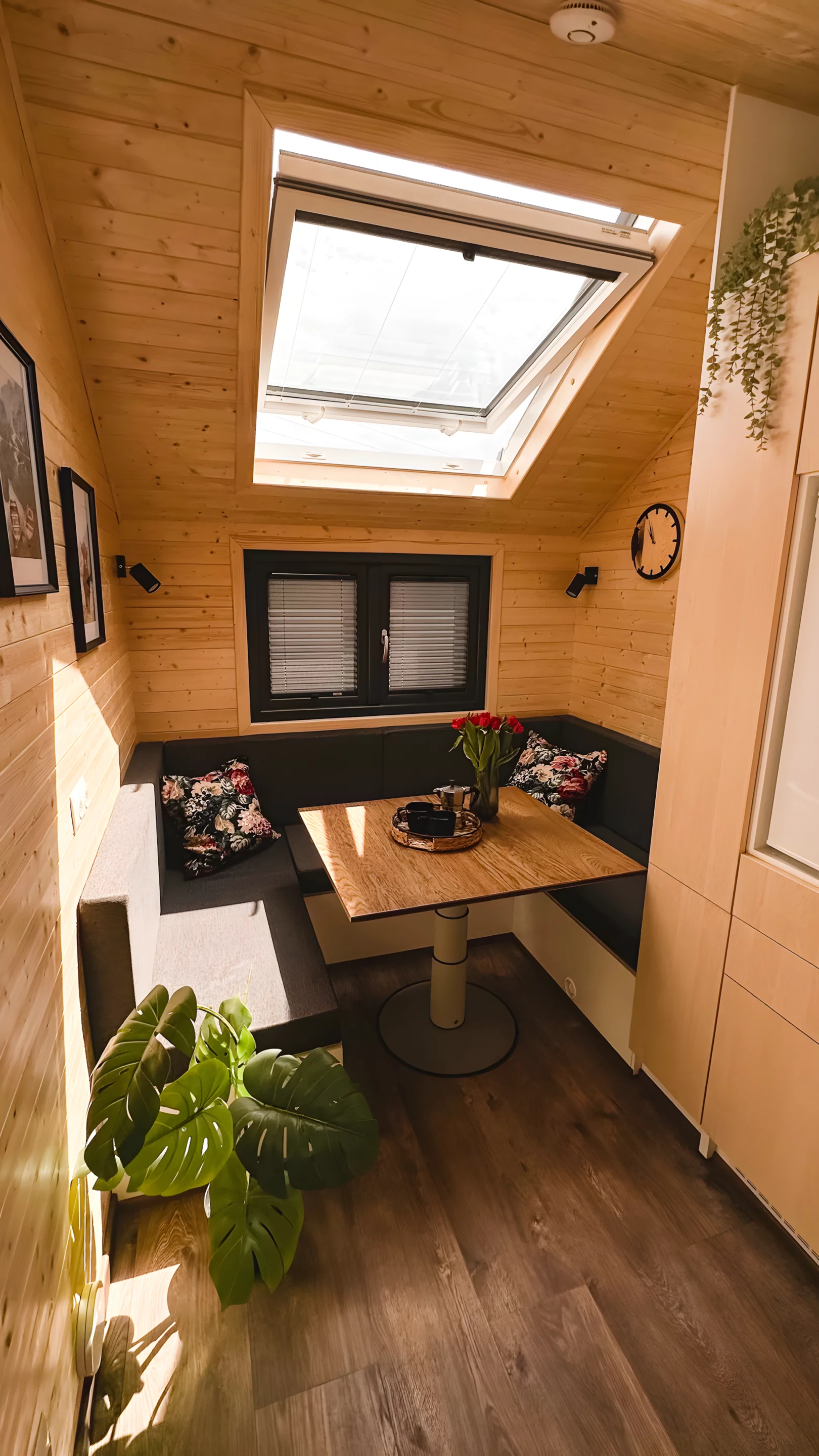 The Honey 216 includes a living area/dining area that transforms into a bedroom