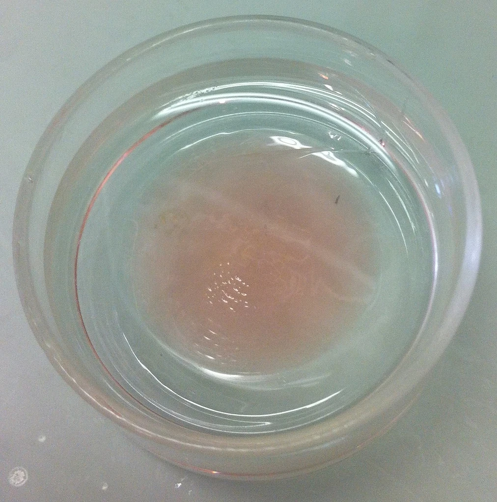 Oil is added to a sample of water