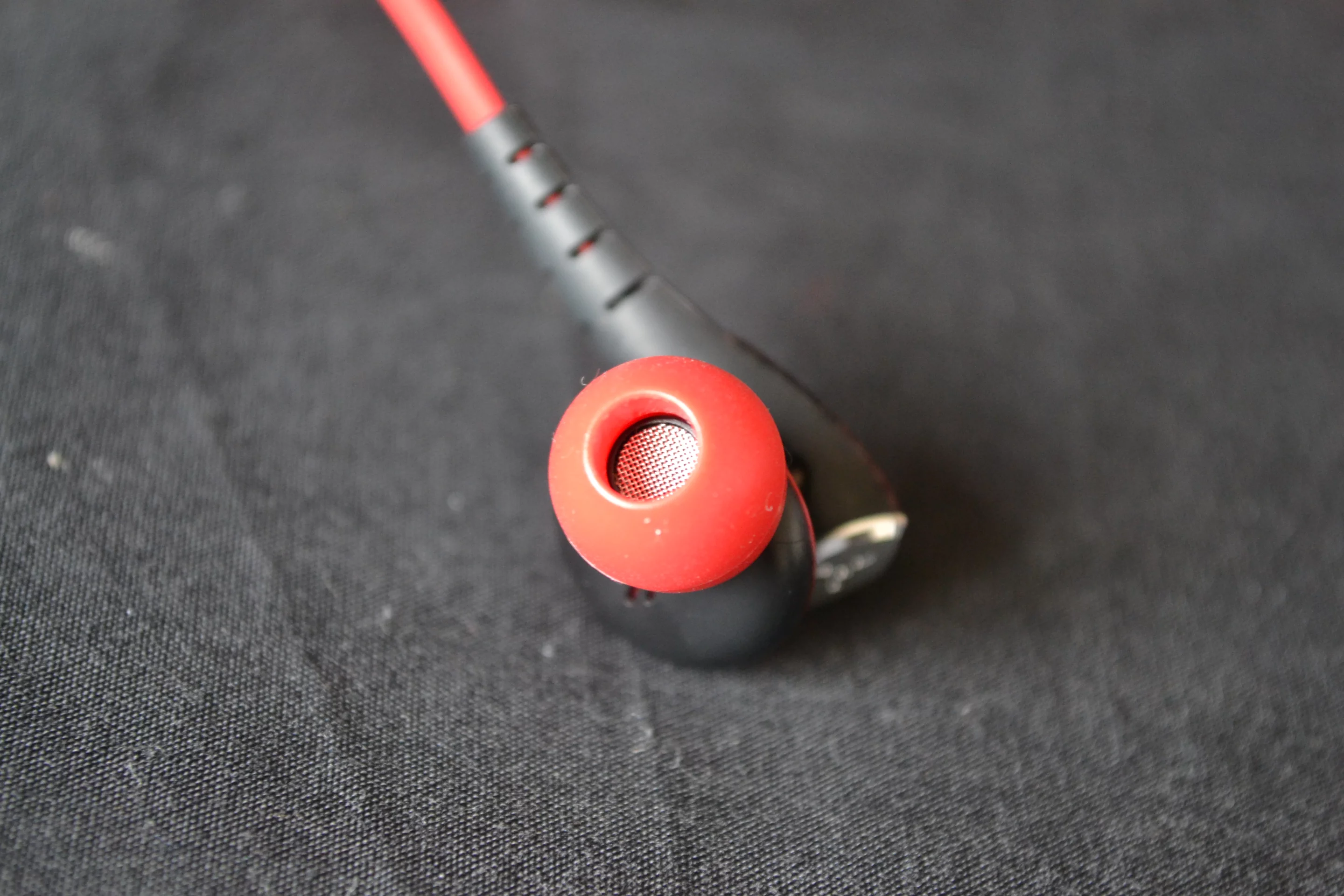 Each ear piece has a custom 14.3-mm dynamic speaker driver with an acoustic damper in front