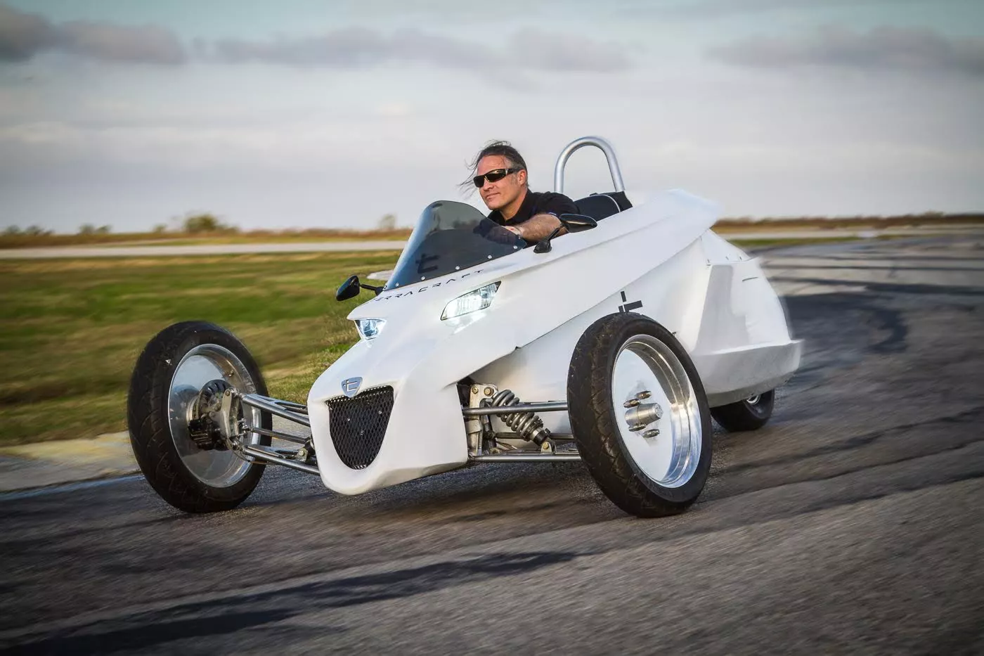 Inventor James "Wes" Abbott takes to the track in the Terracraft SuperTrike