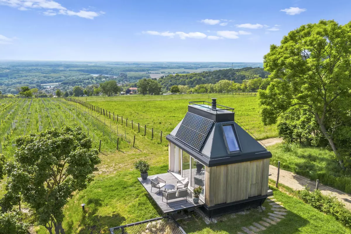 Cabin Devín is a compact tiny house that runs off-the-grid and has a light-filled space-saving layout