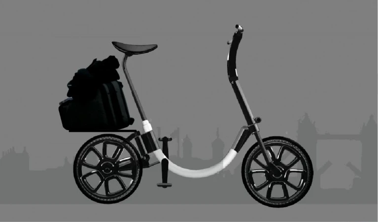 The folding e-bike has a low step-over height frame, airless tires surrounding 20-inch wheels, and a chainless shaft drive system