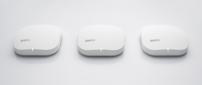 Additional Eero units are plugged into power sockets around the home