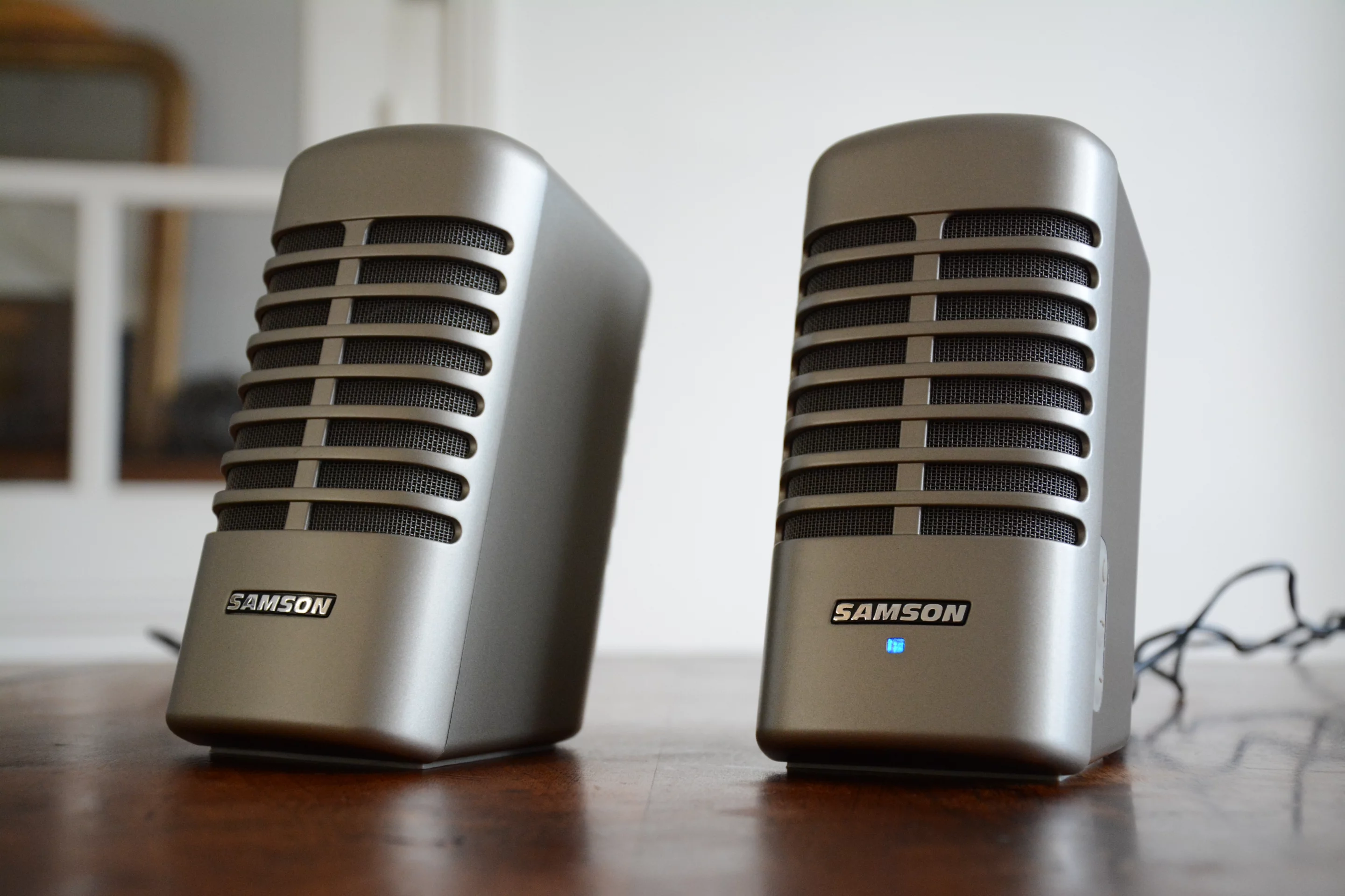 The Meteor M2s look rather like a pair of old Shure or Stromberg-Carlson type microphones sitting on the office desk, but they throw out audio instead of capturing it (Photo: Paul Ridden/Gizmag)