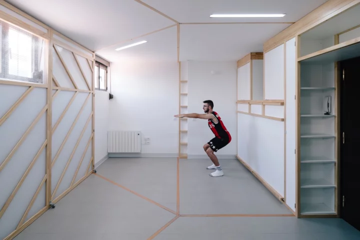 Markings on the floor show where the hinged wood and perspex screen can be placed