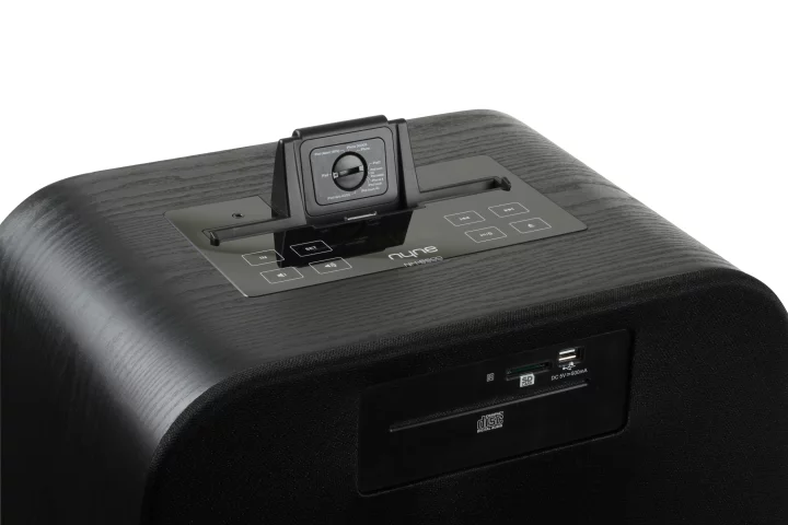 A prominent docking bay on top adjusts to fit most models of iPods, iPhones, and iPads