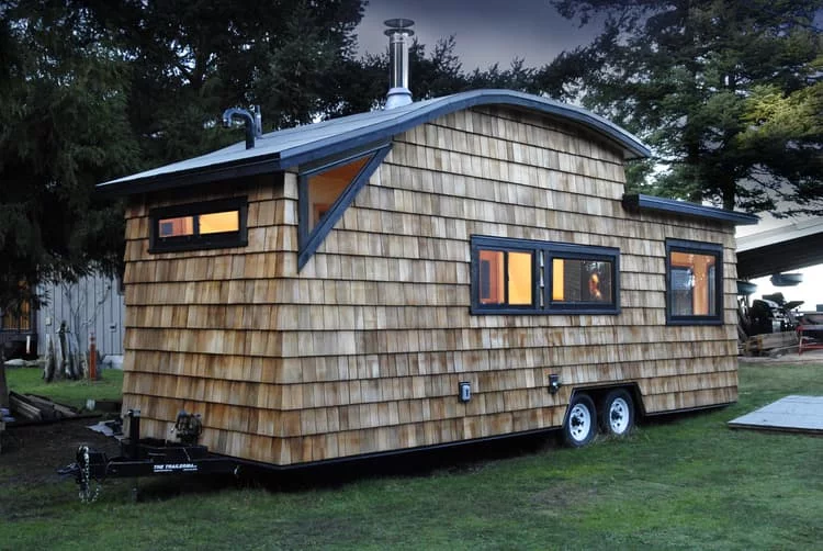 Defined by its large curved roof, the Curved 260 Micro Home shoehorns a lot of home into its small space