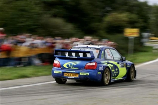 Subaru's Petter Solberg has dropped from second to third in the title and now has Markko Martin just two points behind him
