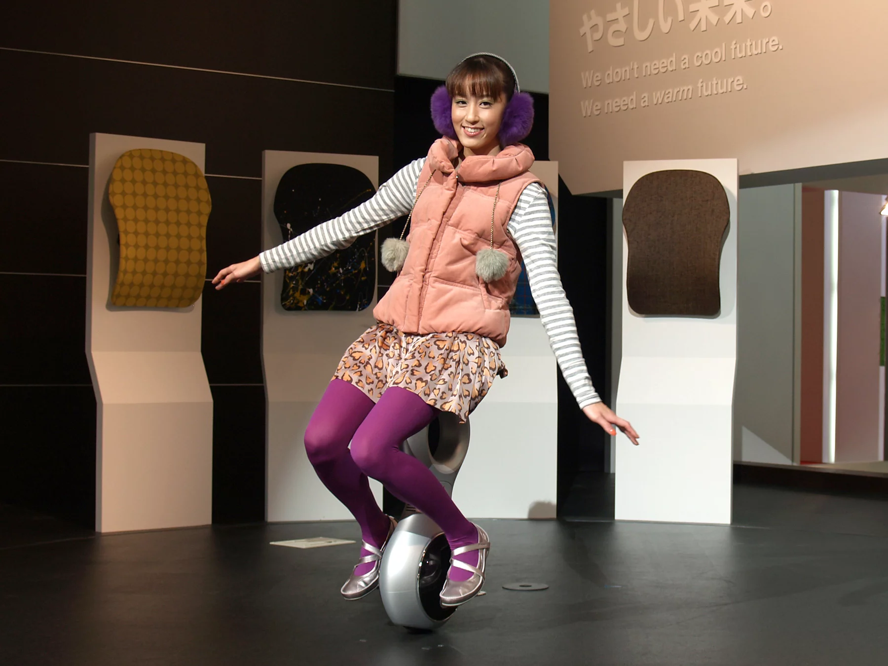 Honda's U3-X on stage at the Tokyo Motor Show in 2011 with demonstration girl flitting around the stage like Tinkerbell (Photo: Mike Hanlon / Gizmag.com)