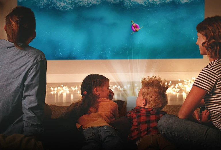 The CineBeam Smart Portable Projector has a small built in speaker for on-the-spot mono, or can pair to two external wireless speakers for stereo sound