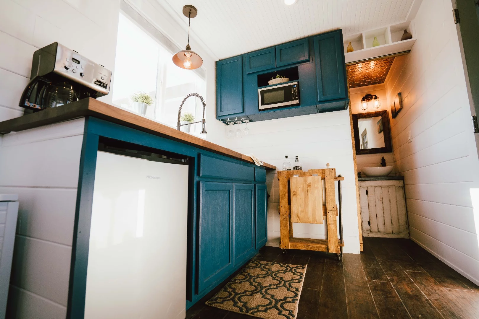 The City's kitchen includes two-burner propane stove and microwave