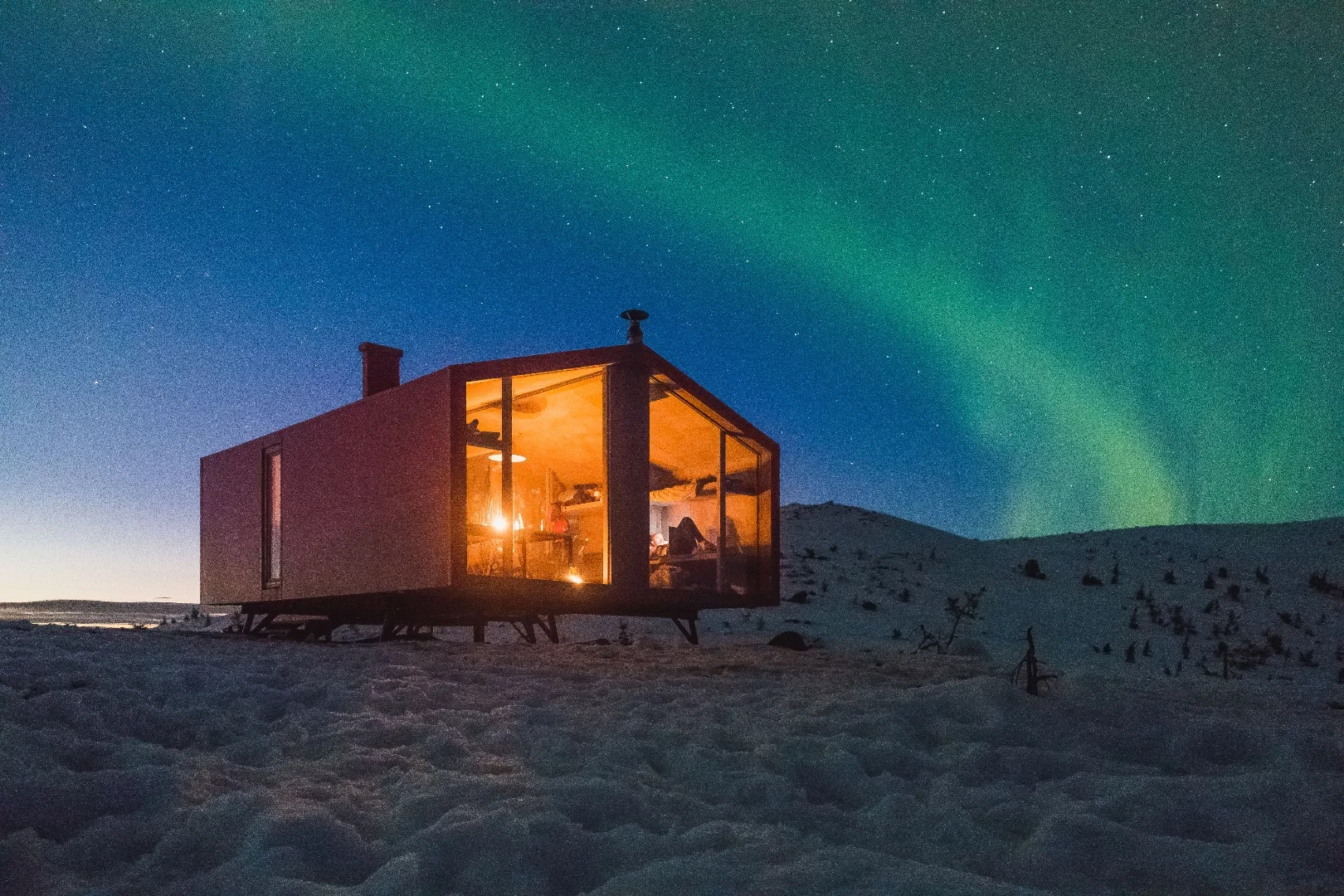 A large window offers views of the frigid tundra and, when conditions are right, the northern lights can be seen too