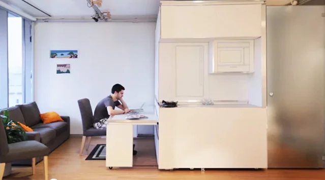 The CityHome unit is designed to transform smaller spaces into larger more usable rooms by concealing key items like a desk, bed, dining room table, etc.