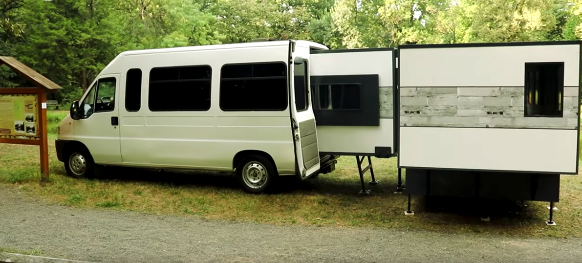 The ioCamper automatically slides out of the van when initiated by smart device, before the campers pull out the side rooms