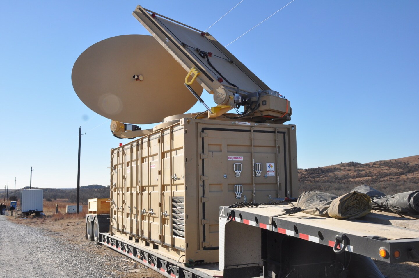 The directed energy system emits an adjustable energy beam that, when aimed at airborne targets such as drones, renders them unable to fly