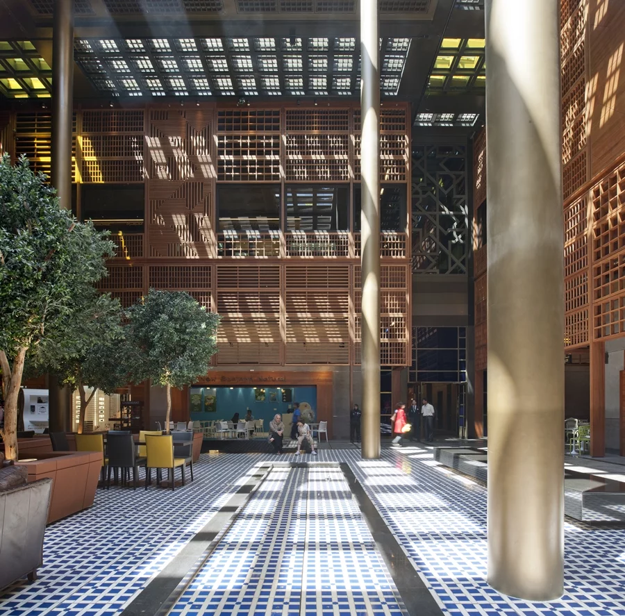 The patterned façade of the Abu Dhabi Central Market provides some shade whilst letting light through (Photo: Nigel Young / Foster + Partners)