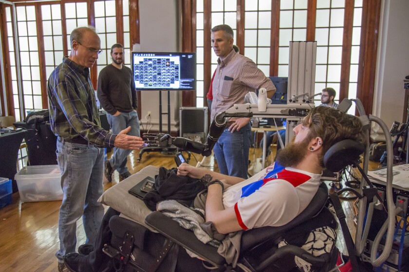 Nathan Copeland and the Pitt-UPMC team demonstrate the system at the White House Frontiers Conference