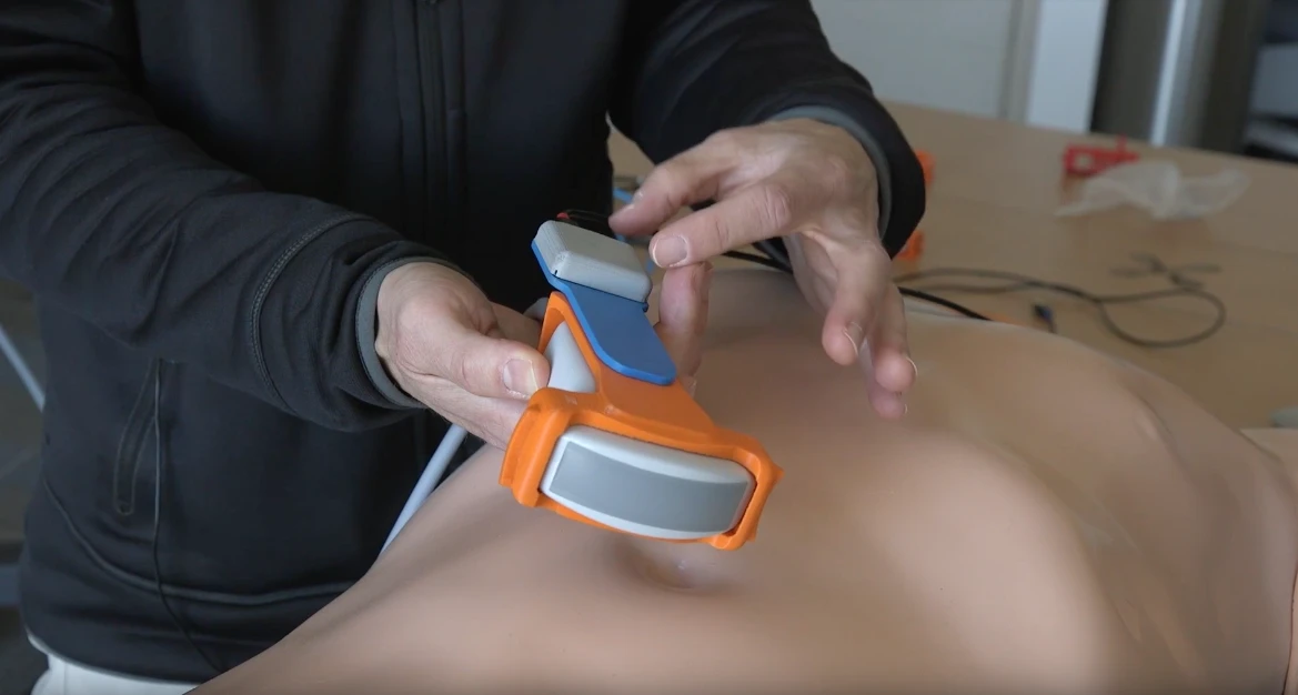 The device easily clips on to any existing ultrasound probe