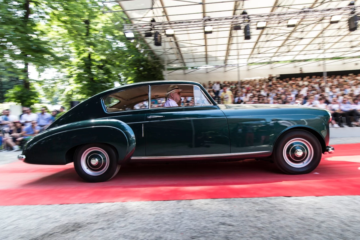 The British coachbuilder H. J. Mulliner & Co. originally began building horse-drawn carriages for the wealthy in the 1760s, graduating to horseless carriages in 1897. Not surprisingly, the automobiles created by the company have always been superb. This Bentley Mk VI Coupé by H.J. Mulliner won the Trofeo Julius Baer for the car at Concorso d'Eleganza Villa d'Este which best showcased exceptional craftsmanship from its time. Owner: Fred Kriz – Monaco