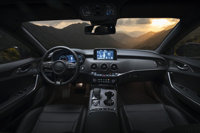 The Stinger has an UVO infotainment system, head-up display and leather-wrapped steering wheel