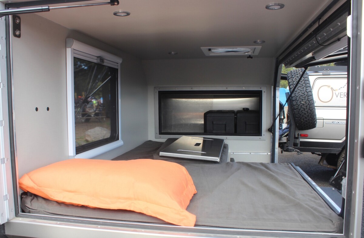 Inside, you can see the removable panel that creates a functional seat for more naturally sitting up to eat or work