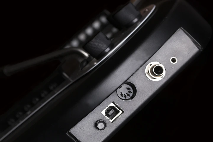 The Lineage MIDI guitar can output via USB, 5-pin MIDI, or an analogue 1/4 inch jack
