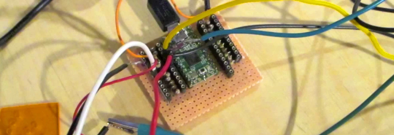 The very first Makey Makey prototype, breadboard and all