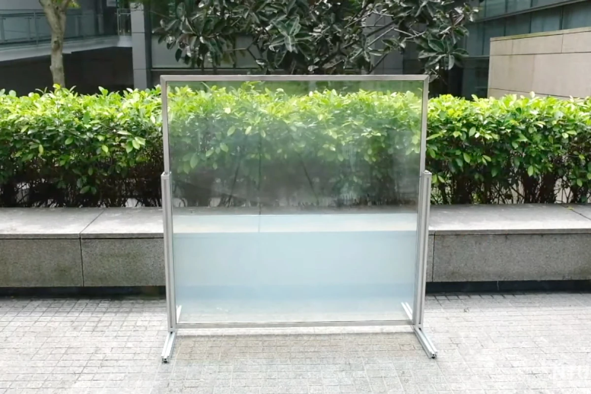 The liquid within one of the smart windows begins to turn opaque as it's warmed by the sun