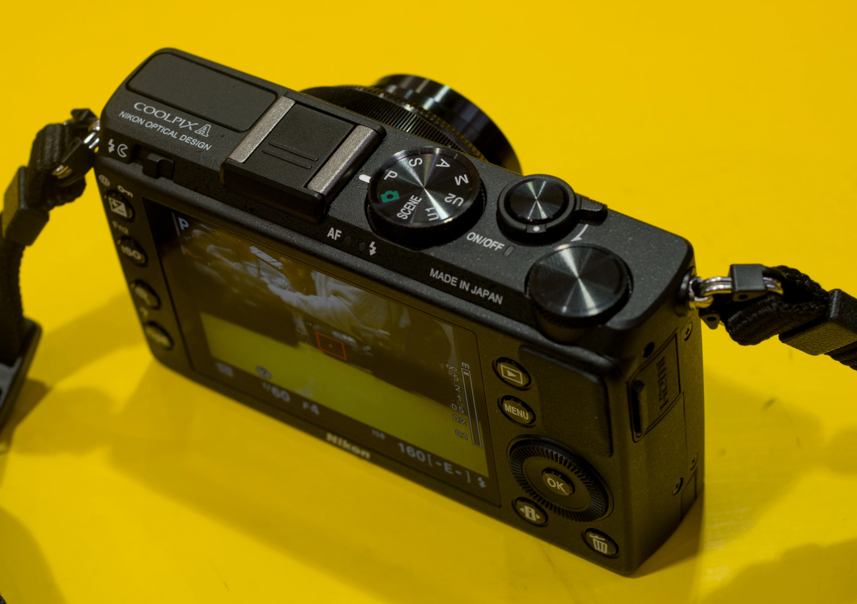 On the top of the Nikon COOLPIX A there's a mode dial with PASM options as well as Auto, Scene and two user options which can be set