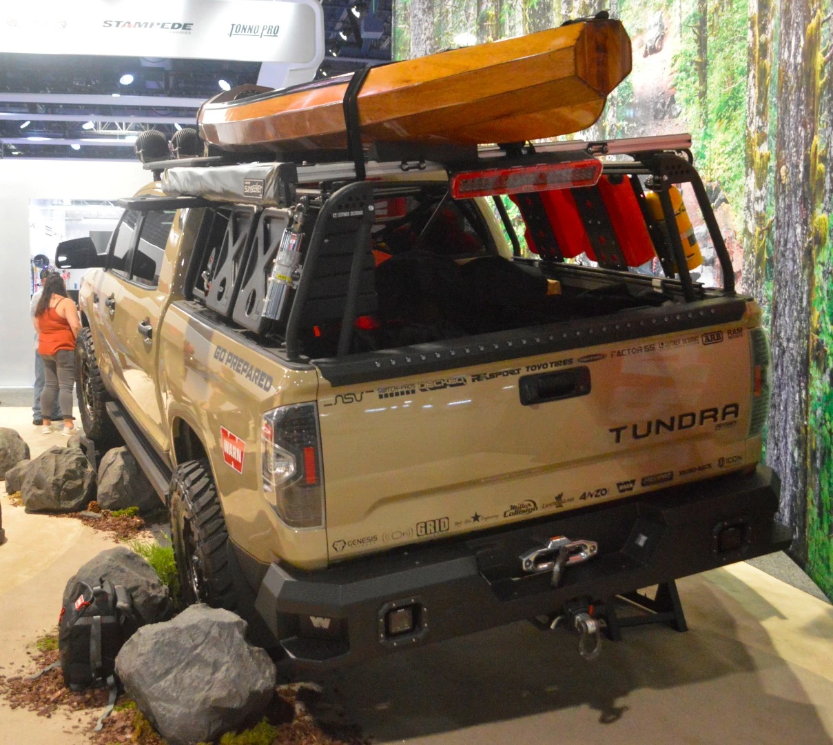 Kitted out Warn Toyota Tundra with a rather fancy canoe on top