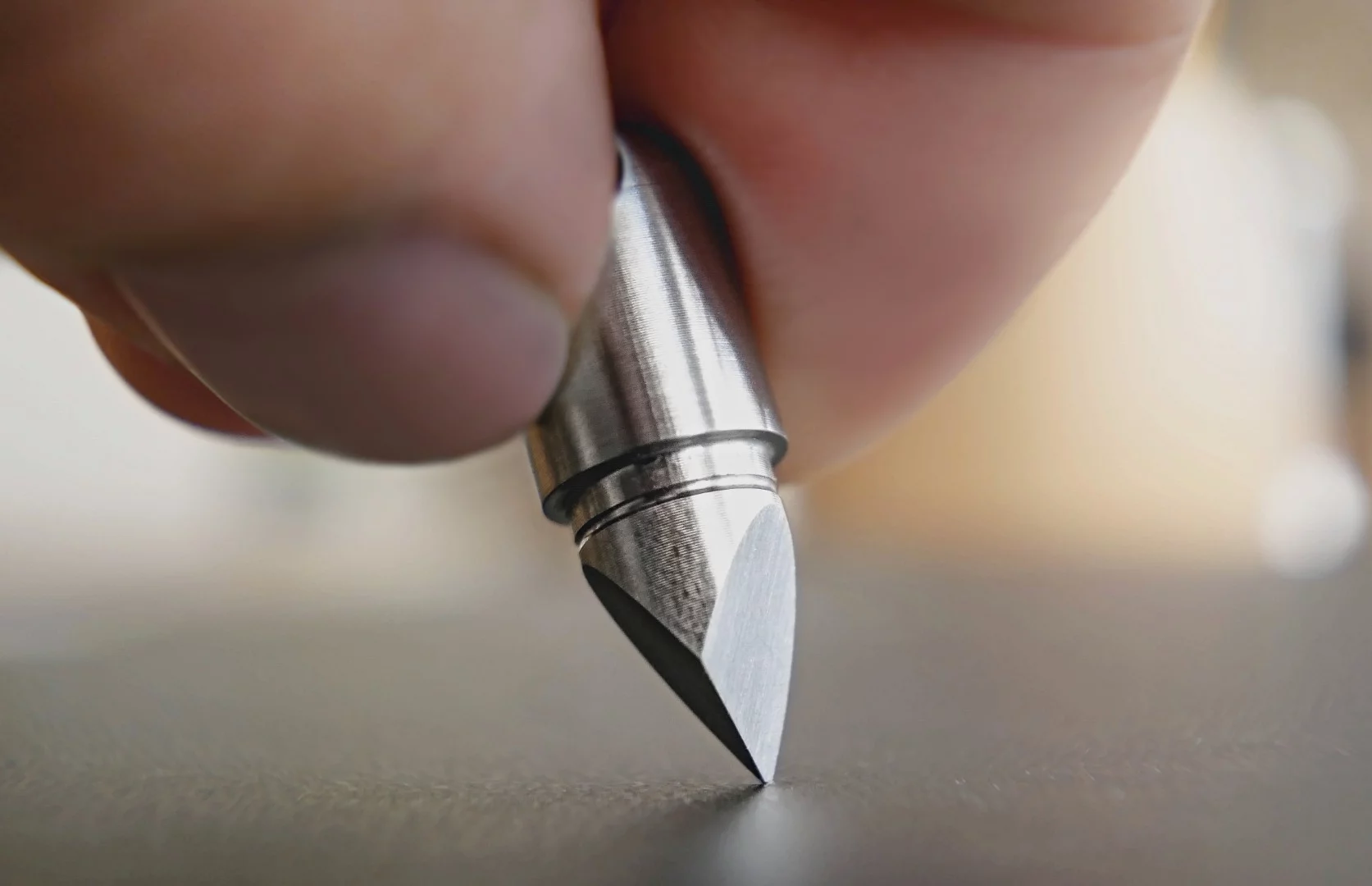 It looks like the head of a pen, but it doesn't pack any ink