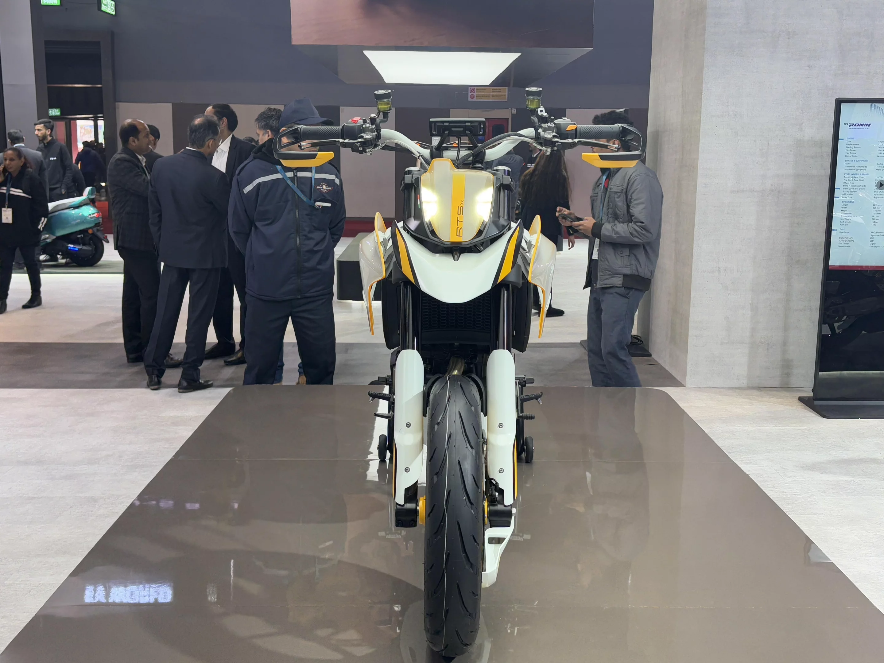 The TVS RTS X Supermoto gets a muscular mudguard and sharp front headlight at the front