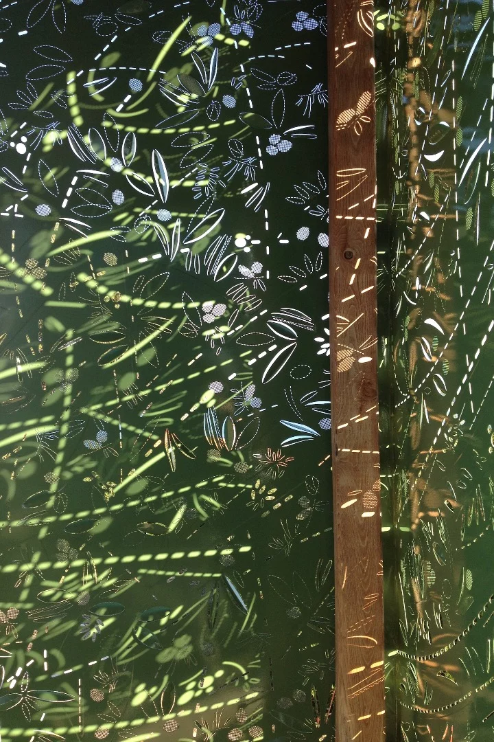 The Olive Tree House's decorative walls, seen close up