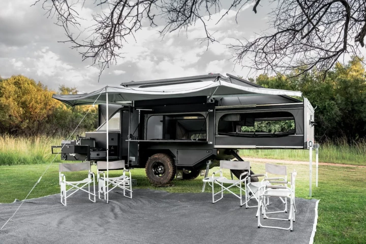Berg's new CX6 trailer rolls fairly compact at under 18 feet long but absolutely explodes in size at camp, sleeping up to six and providing an indoor/outdoor base camp for even more people during the day