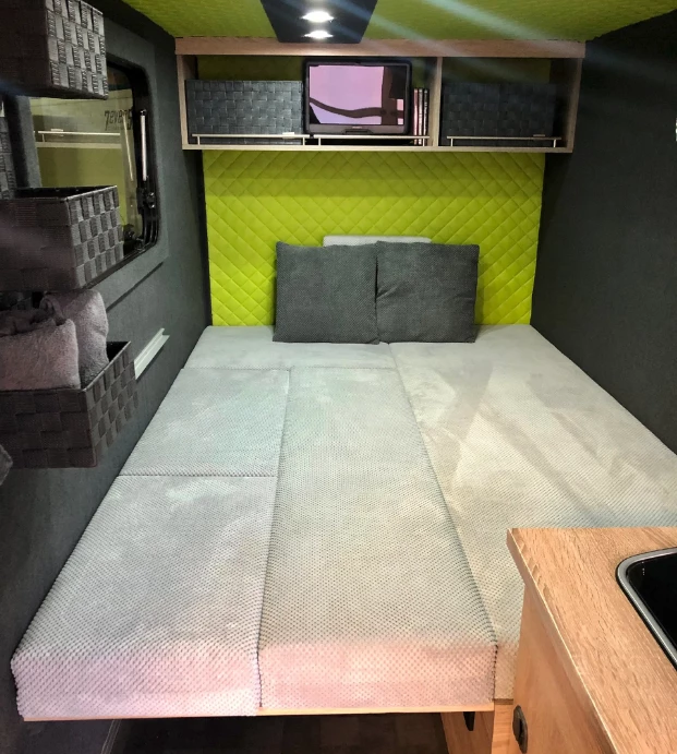 Stretching the full width of the trailer, the bed offers enough space for two