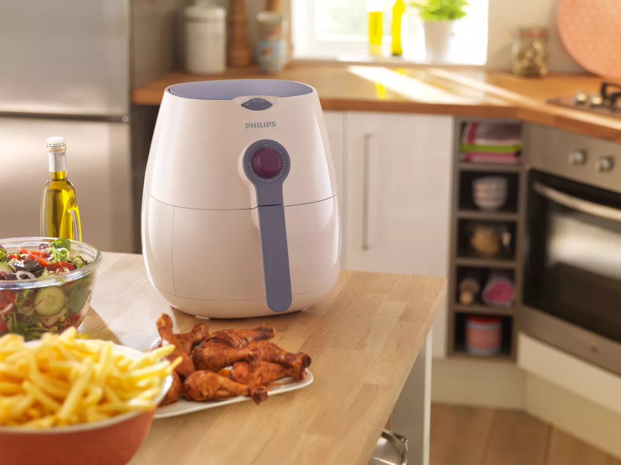 The Philips Airfryer fries food using little or no oil