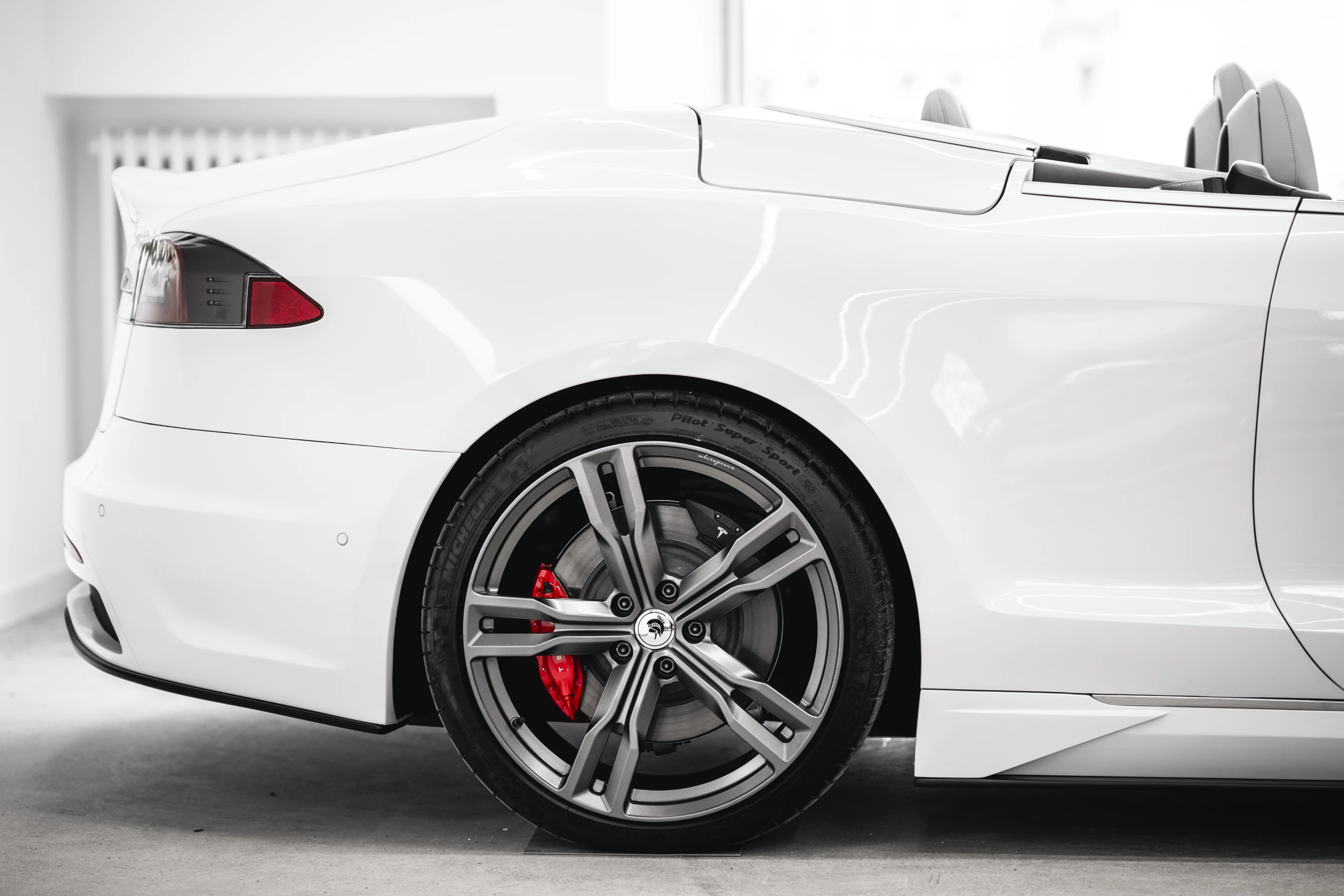 The Ares Model S convertible includes a custom-built rear deck over top the retractable canvas top