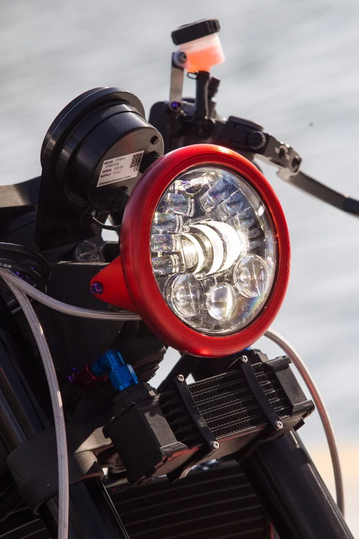 The LED headlight of the DNA Filters DCR-017 includes a cornering function, lighting the inside of the bend