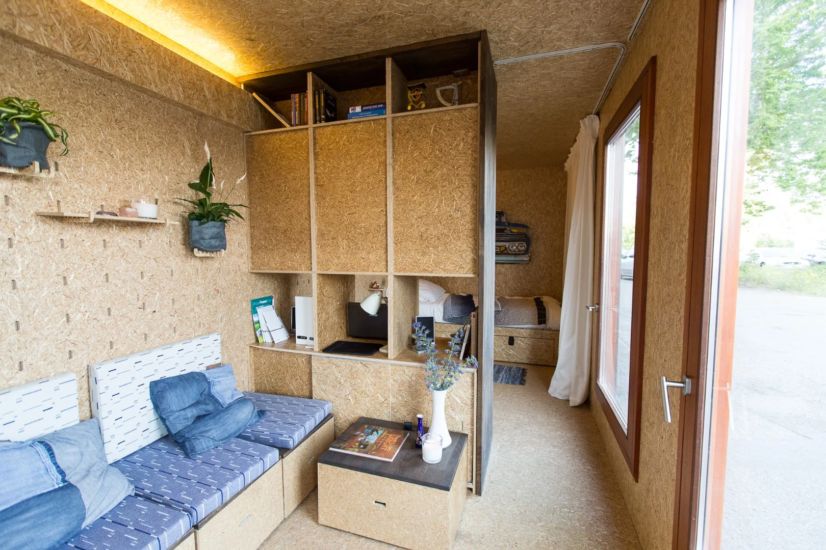 Heating is provided by way of a heat-pump, with sustainable insulation materials used to minimize heat loss